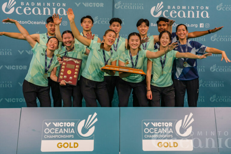 Australia holds the VICTOR Oceania Mixed Team trophy at prizegiving