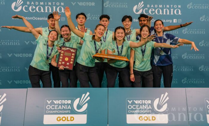 Australia holds the VICTOR Oceania Mixed Team trophy at prizegiving