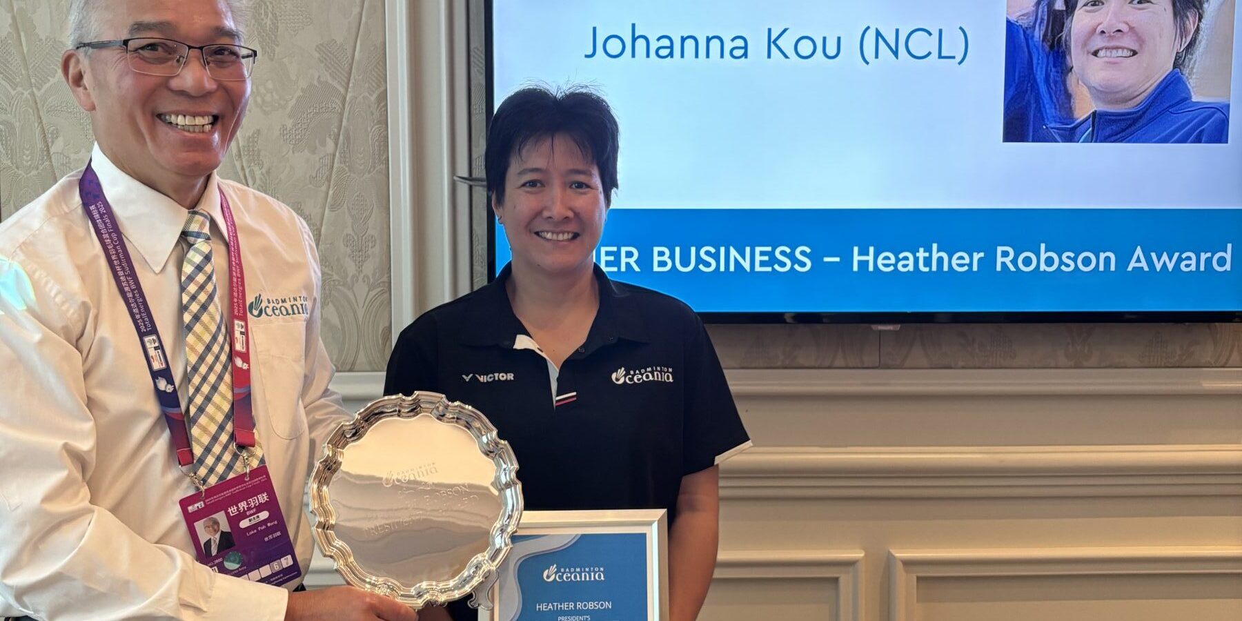 Johanna Kou and BPC President pose with award