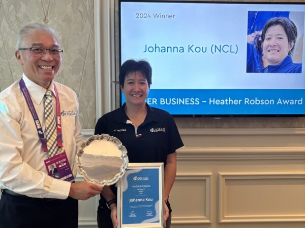 Johanna Kou and BPC President pose with award