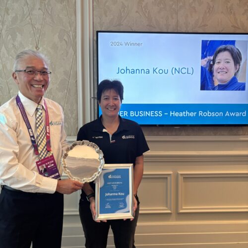 Johanna Kou and BPC President pose with award