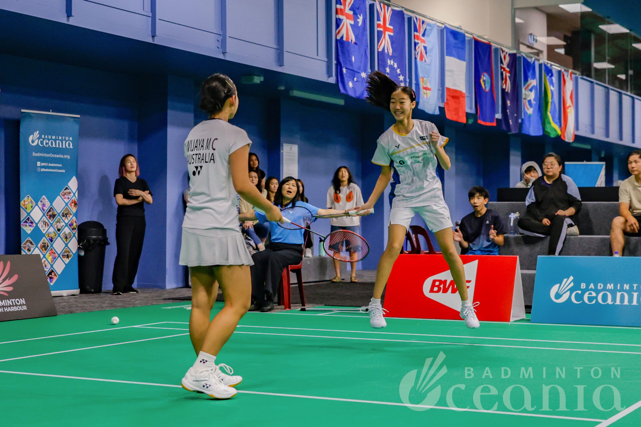VICTOR Oceania Championships 2025 Two girls celebrate winning a point in badminton.