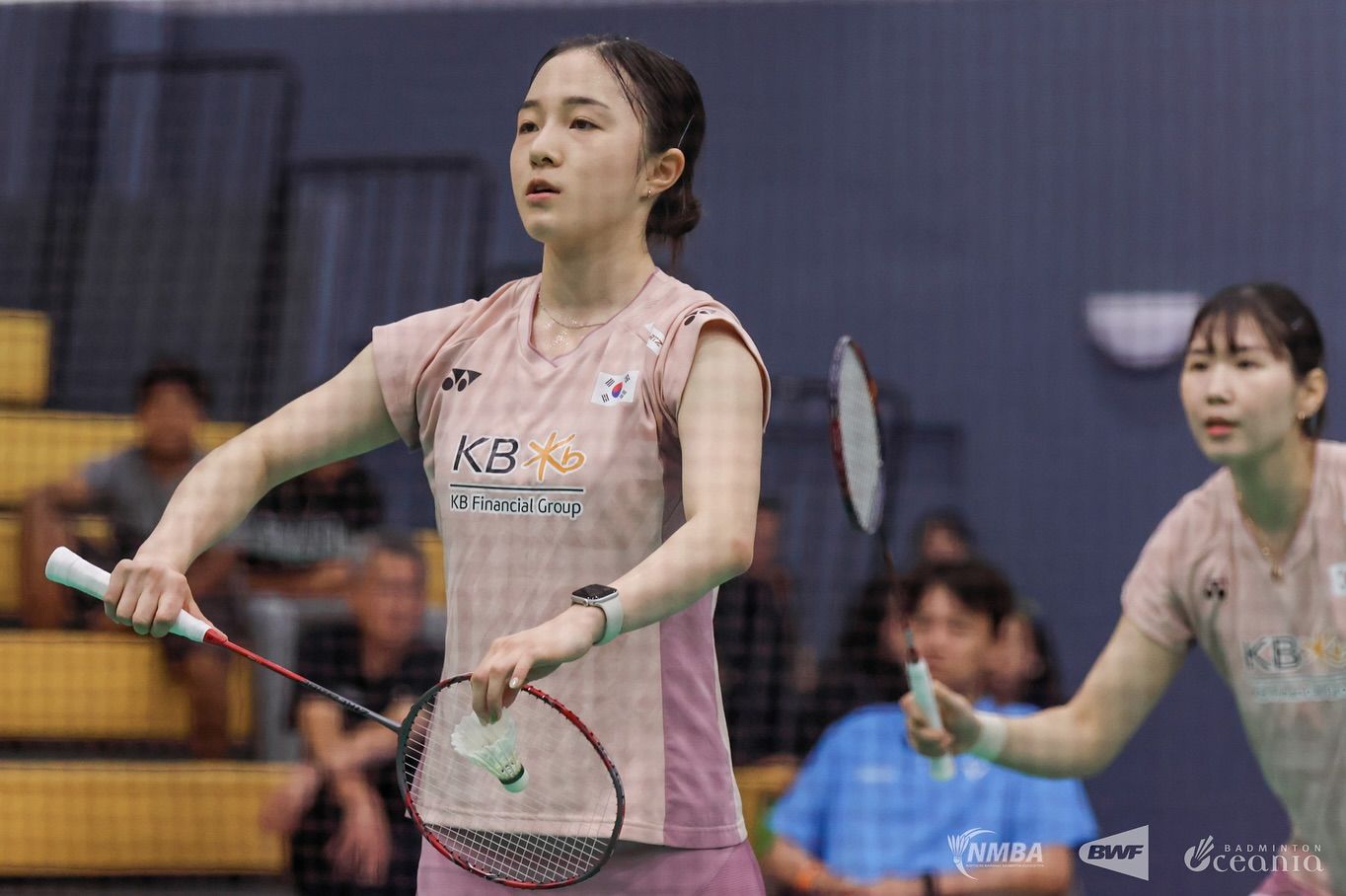 JangKimWD Women's doubles gets ready to serve shuttle