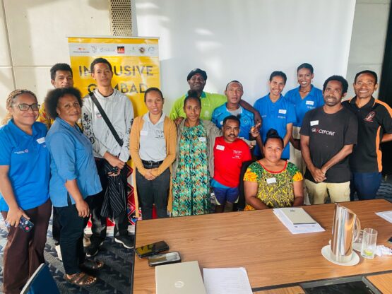 workshop attendees smile for photo