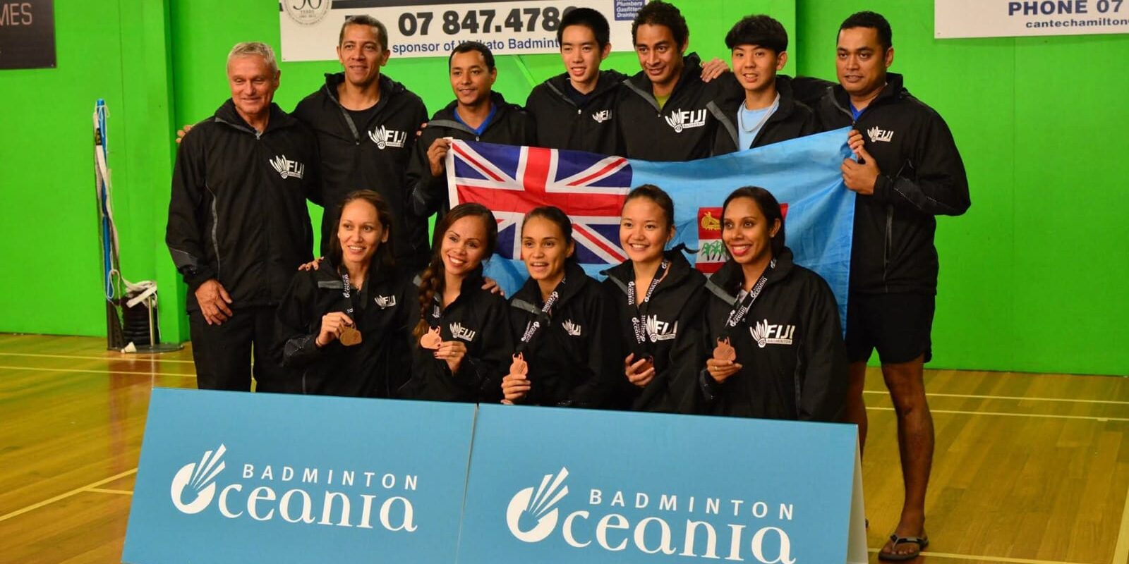 photo 2 karyn barry Fiji mixed badminton team poses with medals