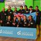 Fiji mixed badminton team poses with medals