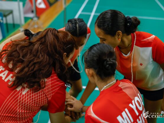 tahiti team huddle before badminton match